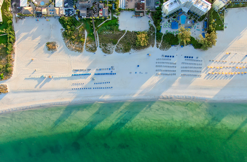 Aerial top view of St Pete beach and resorts in St Petersburg during morning sunrise, Florida USA